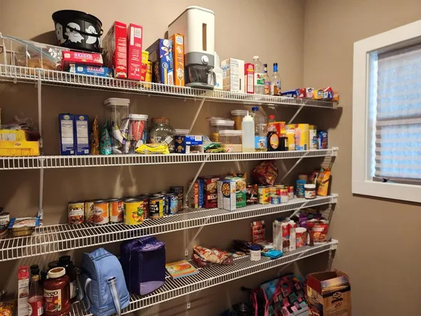 a store room with lots of different kinds of food