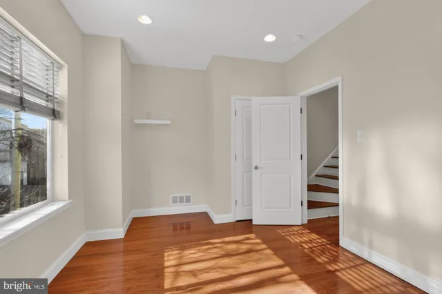 a room that has a bed and a window