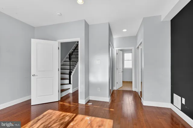 a view of entryway with wooden floor