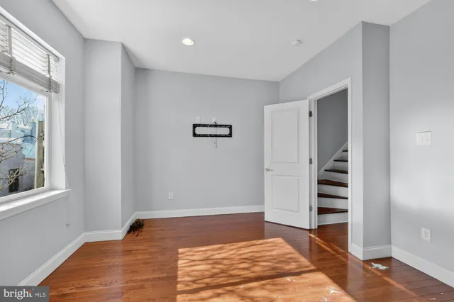 a view of bedroom with furniture and window