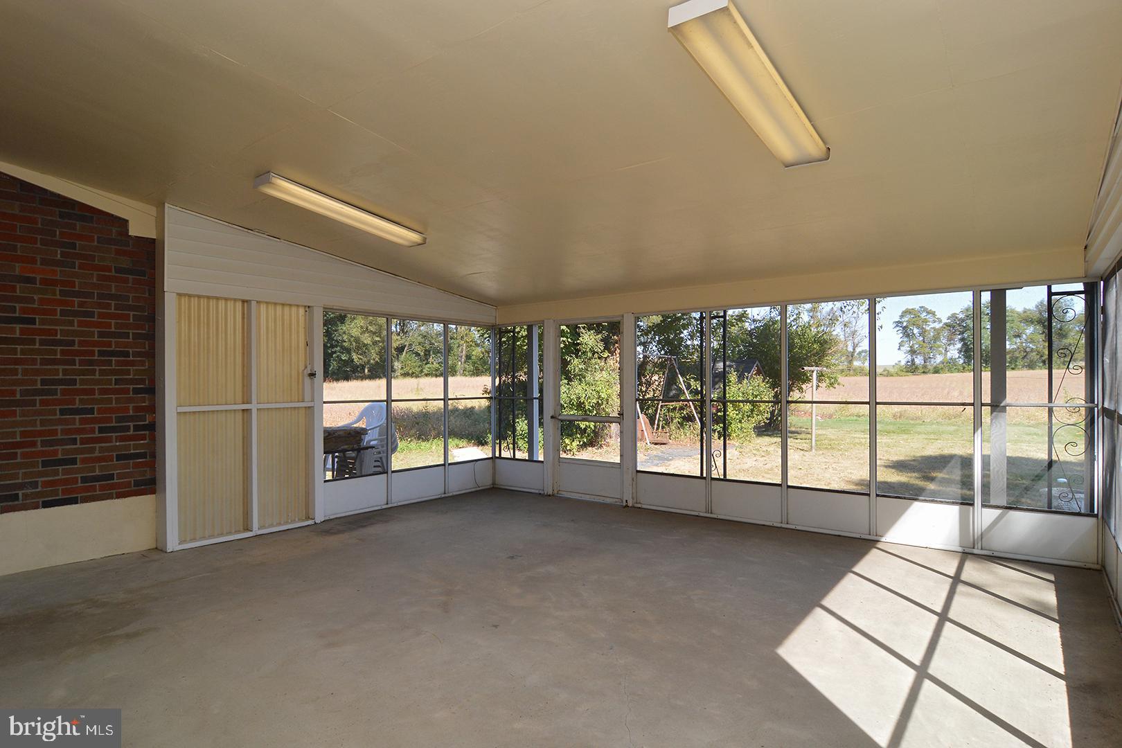 2631 Moselem Spring Road Fleetwood, PA 19522 - Photo 27 of 32 25' x 25' Screened-In Porch
