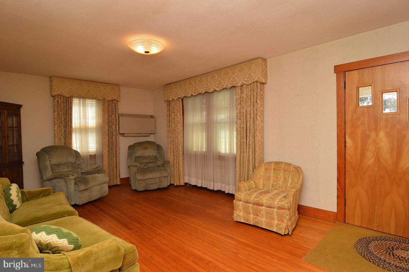 Living Room W/ Beautiful Hardwood Floors
