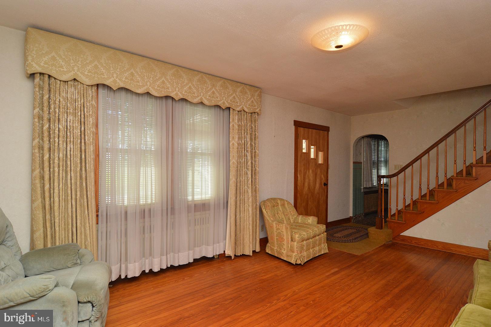 Living Room W/ Beautiful Hardwood Floors