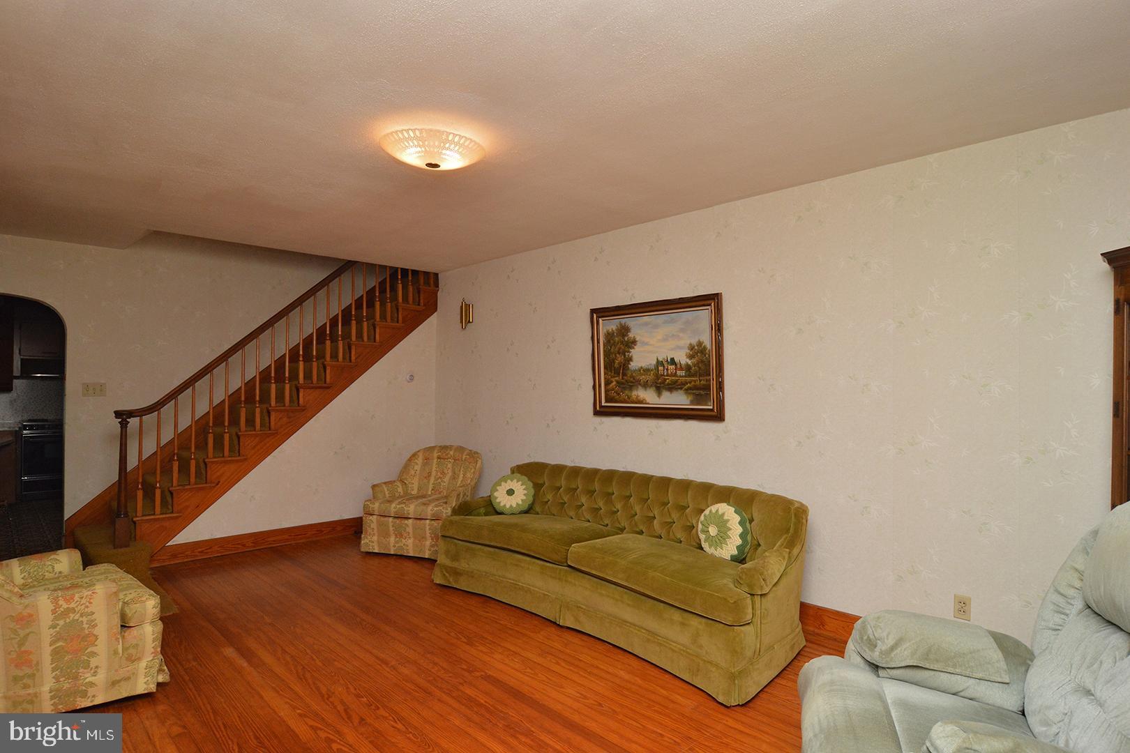 Living Room W/ Beautiful Hardwood Floors