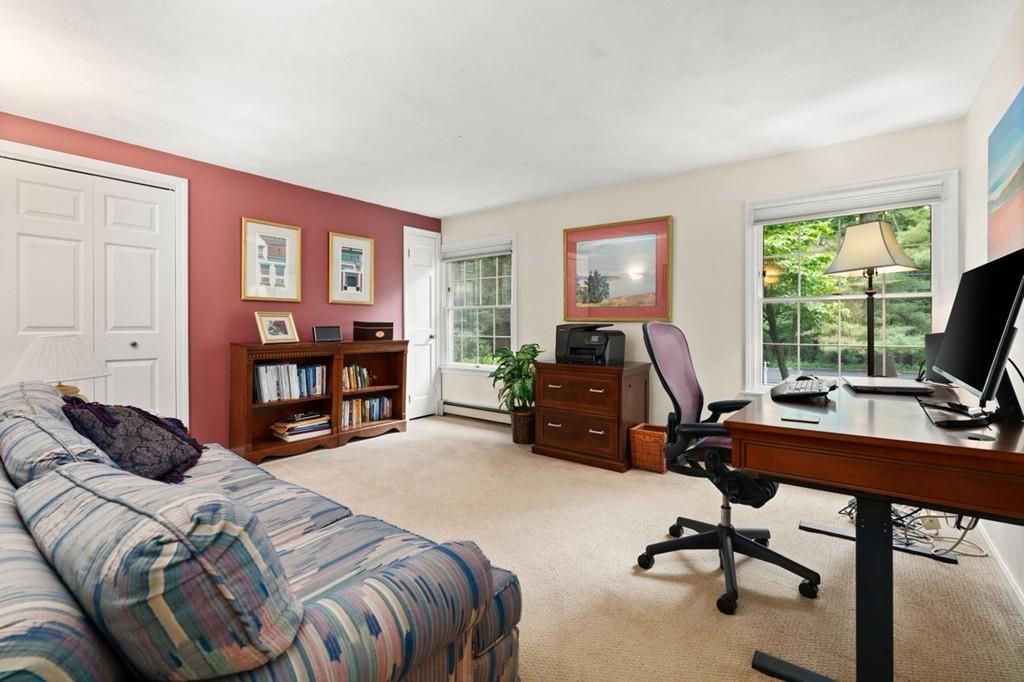 228 Cochituate Road Wayland, MA 01778 - Photo 18 of 32 a view of a livingroom with workspace and a window