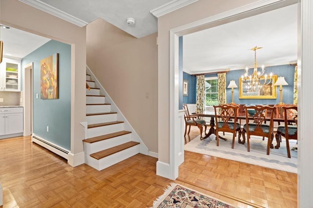 228 Cochituate Road Wayland, MA 01778 - Photo 19 of 32 a view of a dining room with furniture