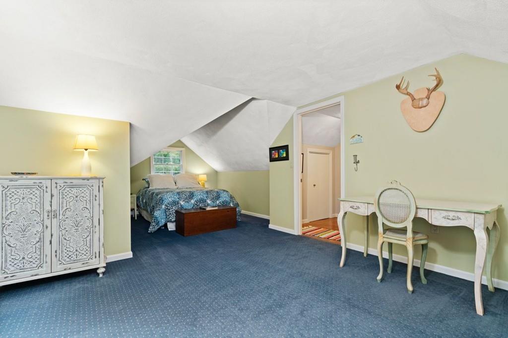 228 Cochituate Road Wayland, MA 01778 - Photo 21 of 32 a bedroom with furniture and a window