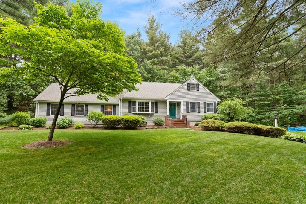 228 Cochituate Road Wayland, MA 01778 - Photo 28 of 32 a front view of a house with a garden