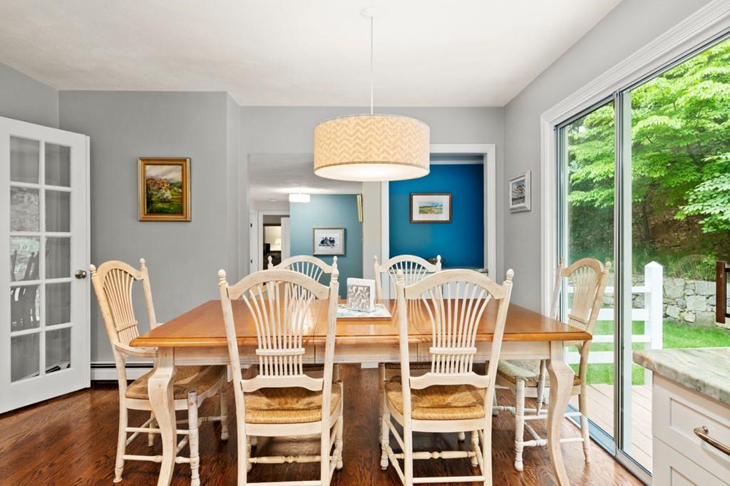 228 Cochituate Road Wayland, MA 01778 - Photo 7 of 32 a view of a dining room with furniture and wooden floor
