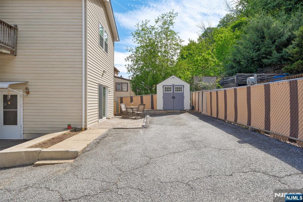 562 Valley Road Clifton, NJ 07013 - Photo 34 of 35 a view of a house with backyard and sitting area