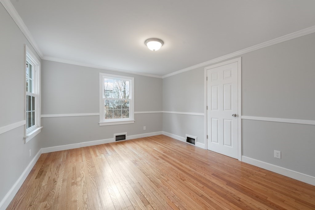 438 Tinkham Road Springfield, MA 01129 - Photo 13 of 23 a view of empty room with wooden floor and fan