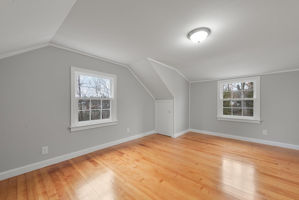 438 Tinkham Road Springfield, MA 01129 - Photo 19 of 23 a view of empty room with wooden floor and fan
