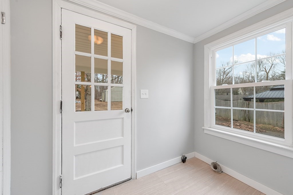438 Tinkham Road Springfield, MA 01129 - Photo 5 of 23 a view of empty room with windows
