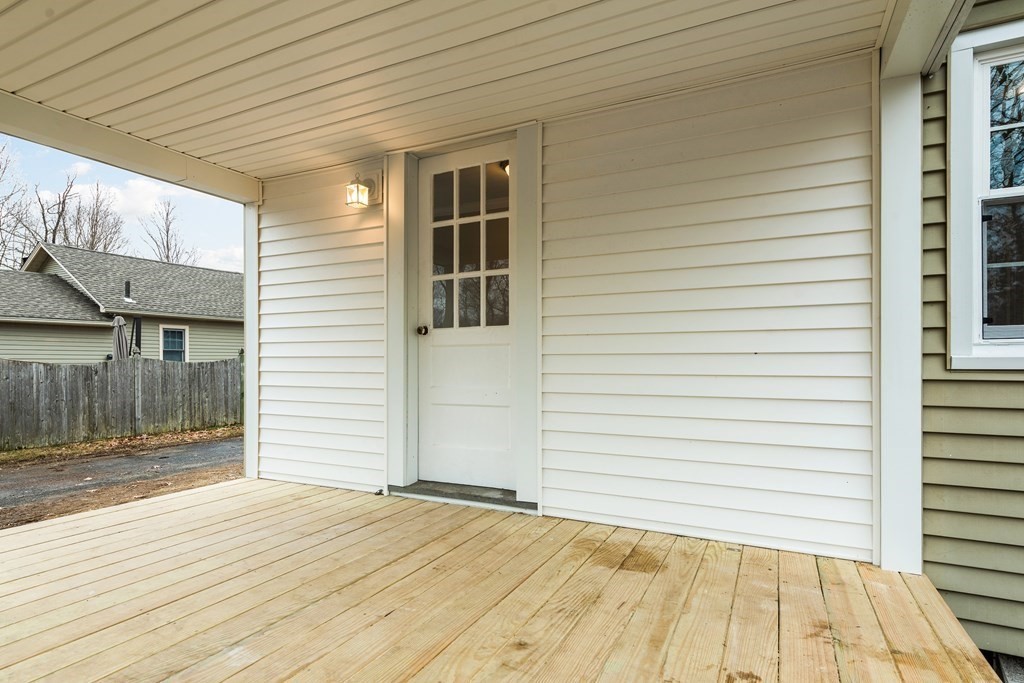 438 Tinkham Road Springfield, MA 01129 - Photo 6 of 23 a view of a house with a backyard