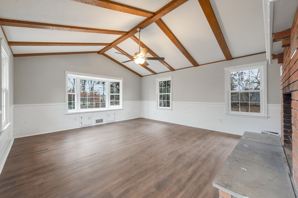 438 Tinkham Road Springfield, MA 01129 - Photo 9 of 23 an empty room with wooden floor and windows