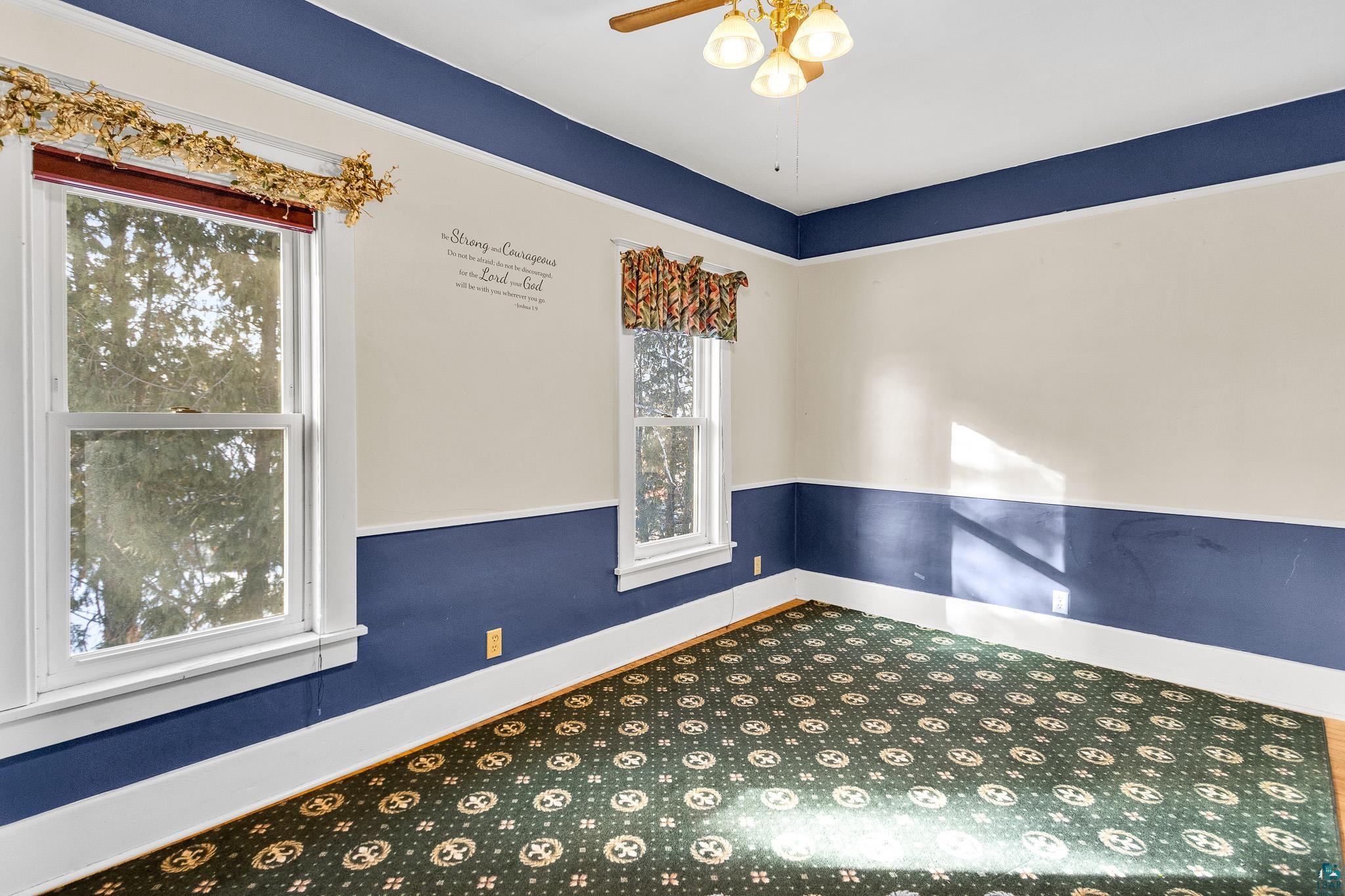 6494 School Street Finlayson, MN 55735 - Photo 16 of 31 Carpeted empty room with ceiling fan and baseboards