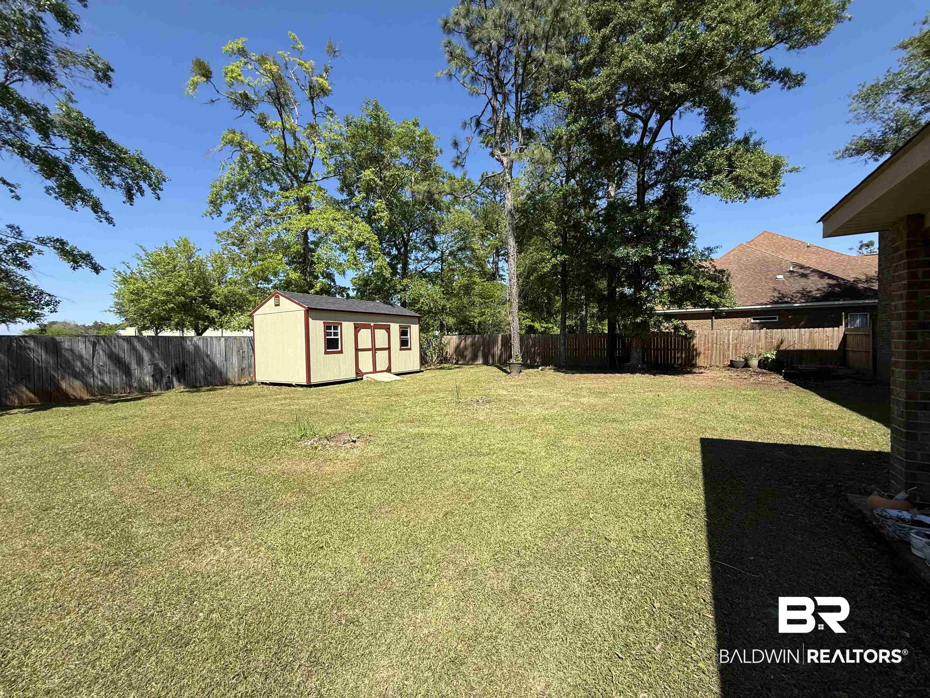 9023 Krystal Ridge Court Daphne, AL 36526 - Photo 34 of 41 Fenced backyard with a shed