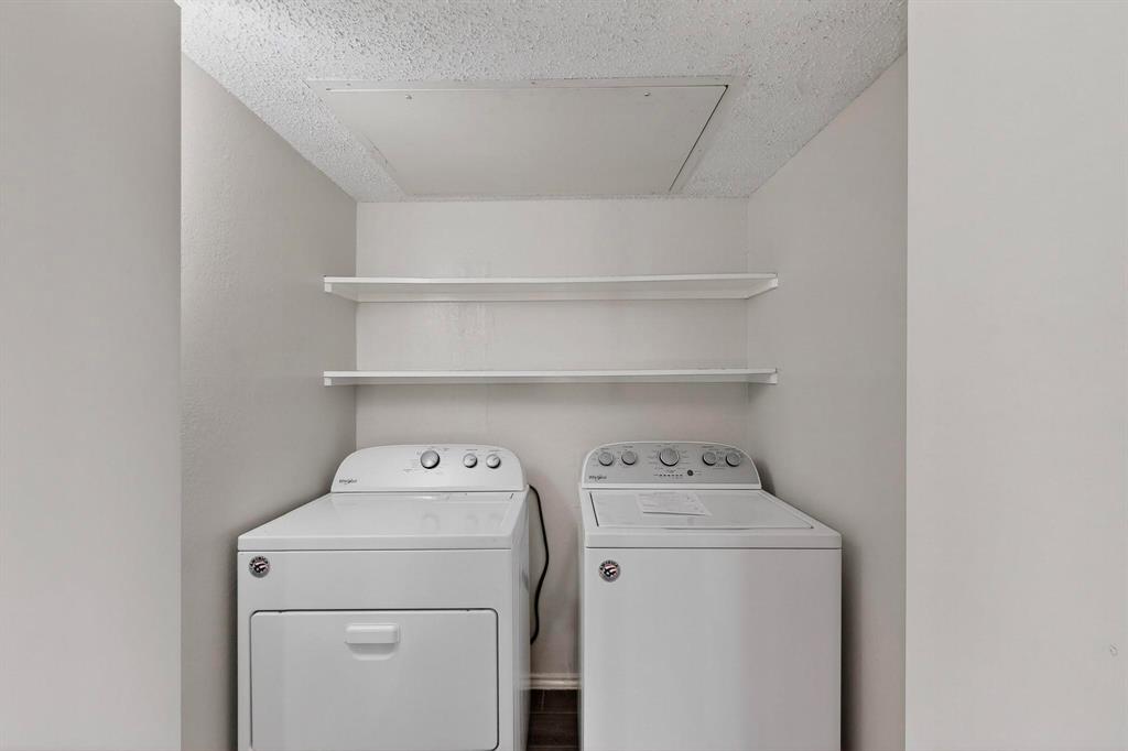 5840 Spring Valley Road, Unit 810 Dallas, TX 75254 - Photo 31 of 40 a utility room with dryer and washer