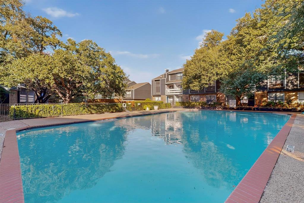 5840 Spring Valley Road, Unit 810 Dallas, TX 75254 - Photo 36 of 40 a view of a lake with houses