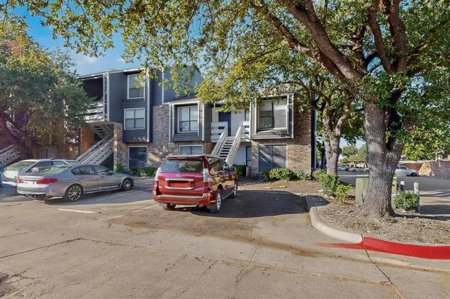 a car parked in front of a house