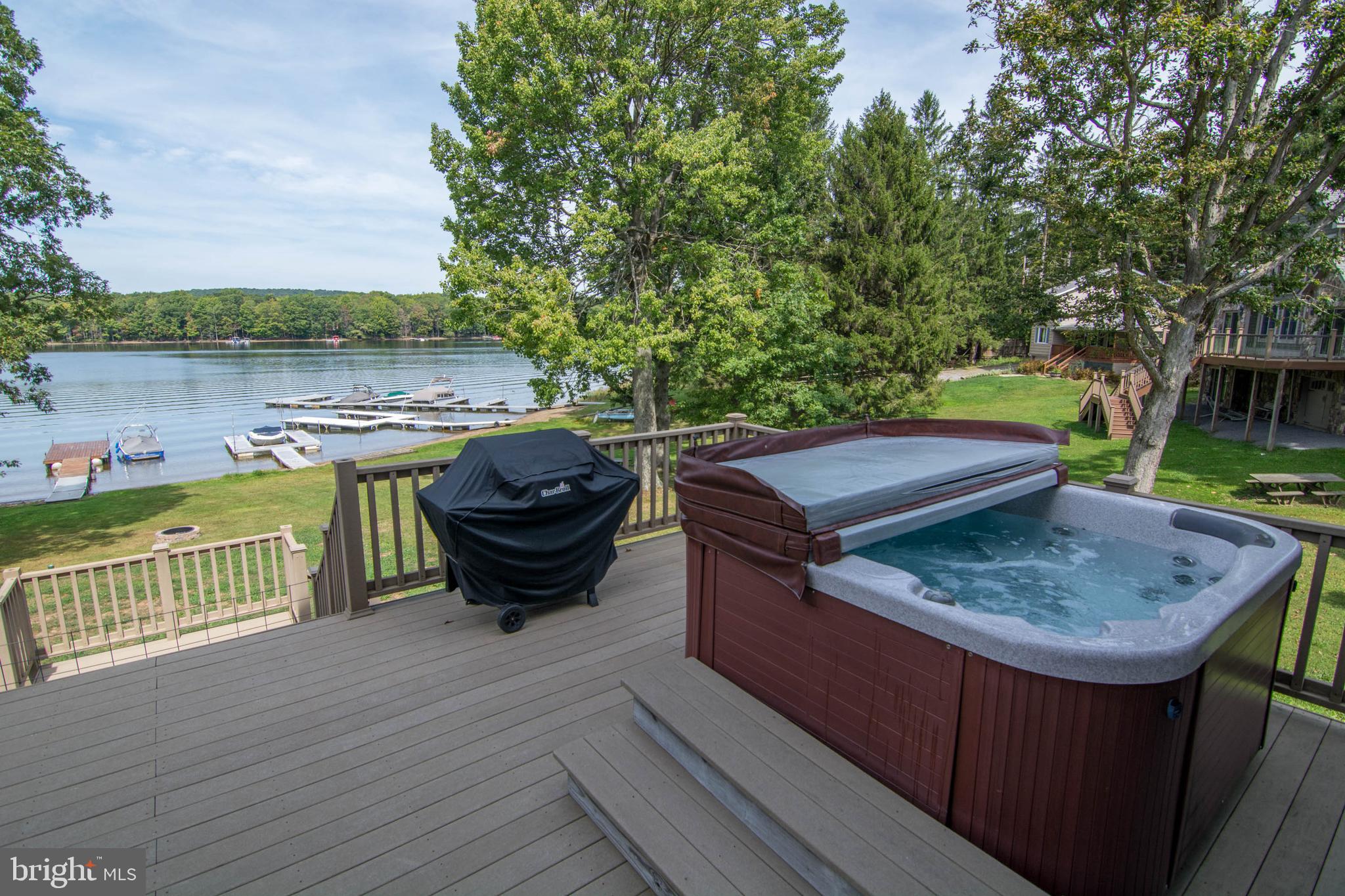 595 Hazelhurst Road Swanton, MD 21561 - Photo 7 of 53 Lakeside Deck w/ Hot Tub