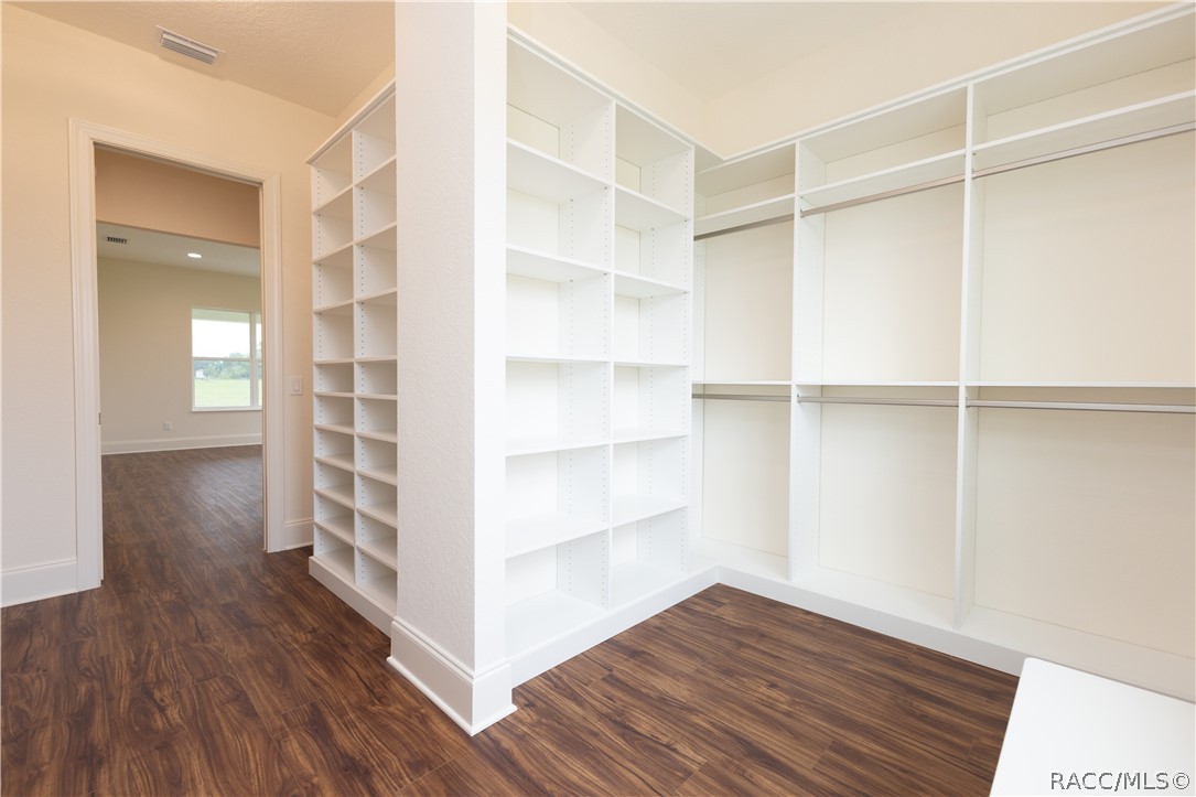 1439 Cr212 Road Oxford, FL 34484 - Photo 19 of 48 Walk-in closet of primary bedroom