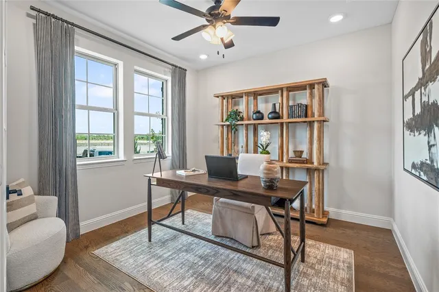 a bathroom with a toilet a sink and a mirror