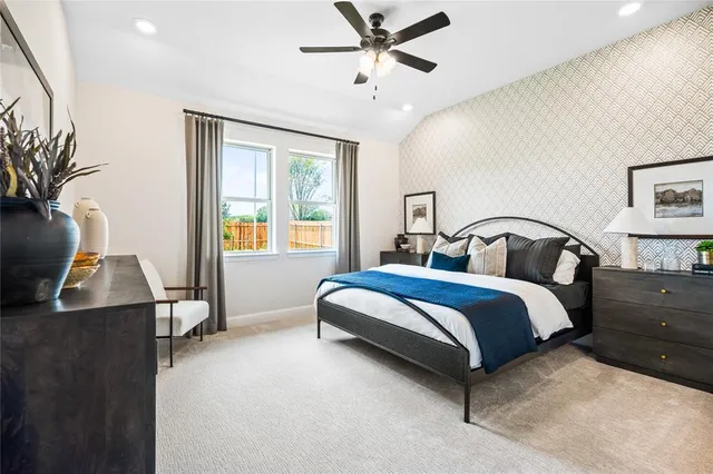 a en suite spacious bathroom with a tub shower and window