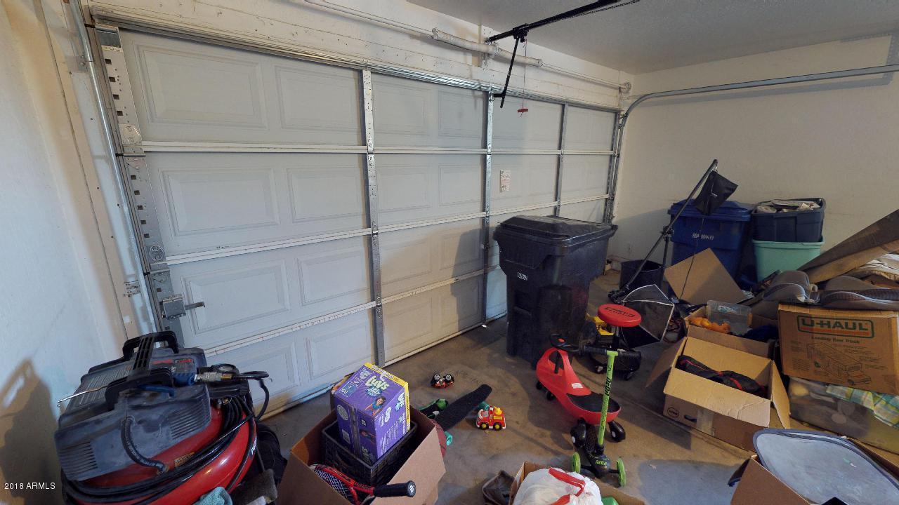 15038 West Wethersfield Road Surprise, AZ 85379 - Photo 27 of 40 Garage