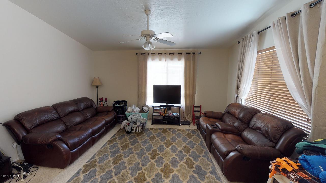 15038 West Wethersfield Road Surprise, AZ 85379 - Photo 10 of 40 Great Room 2