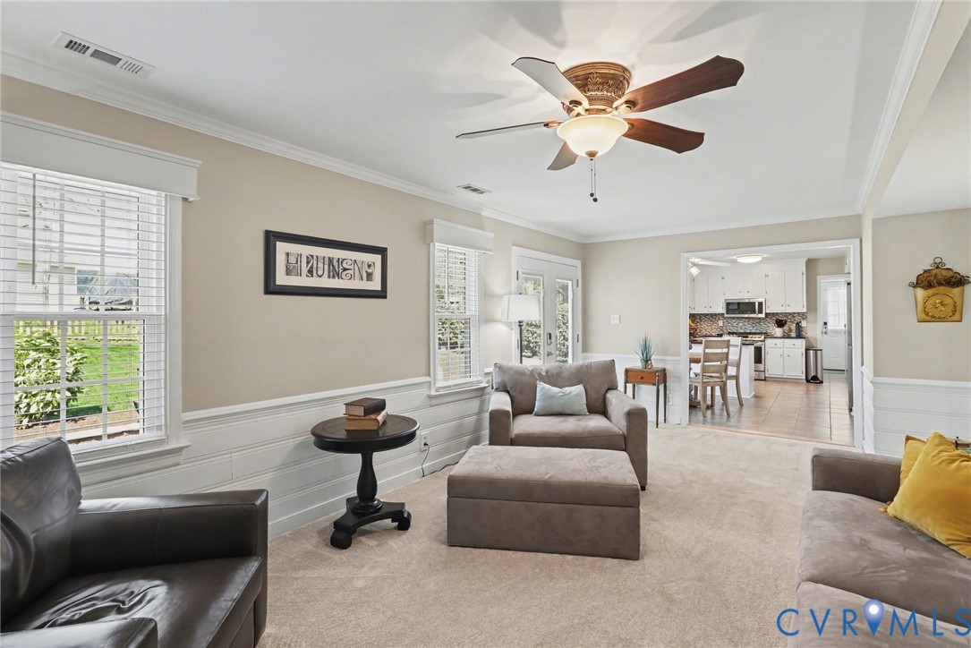 548 Glenmeadow Road Midlothian, VA 23114 - Photo 4 of 31 a living room with furniture and a window