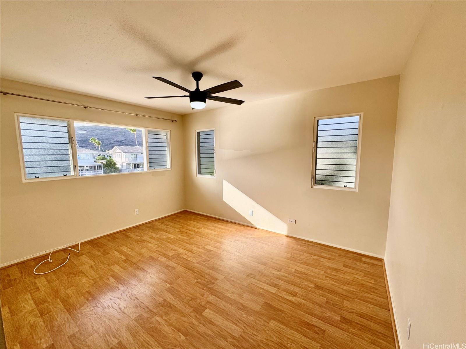 369 Opihikao Place, Unit 352 Honolulu, HI 96825 - Photo 19 of 25 a view of an empty room with a window