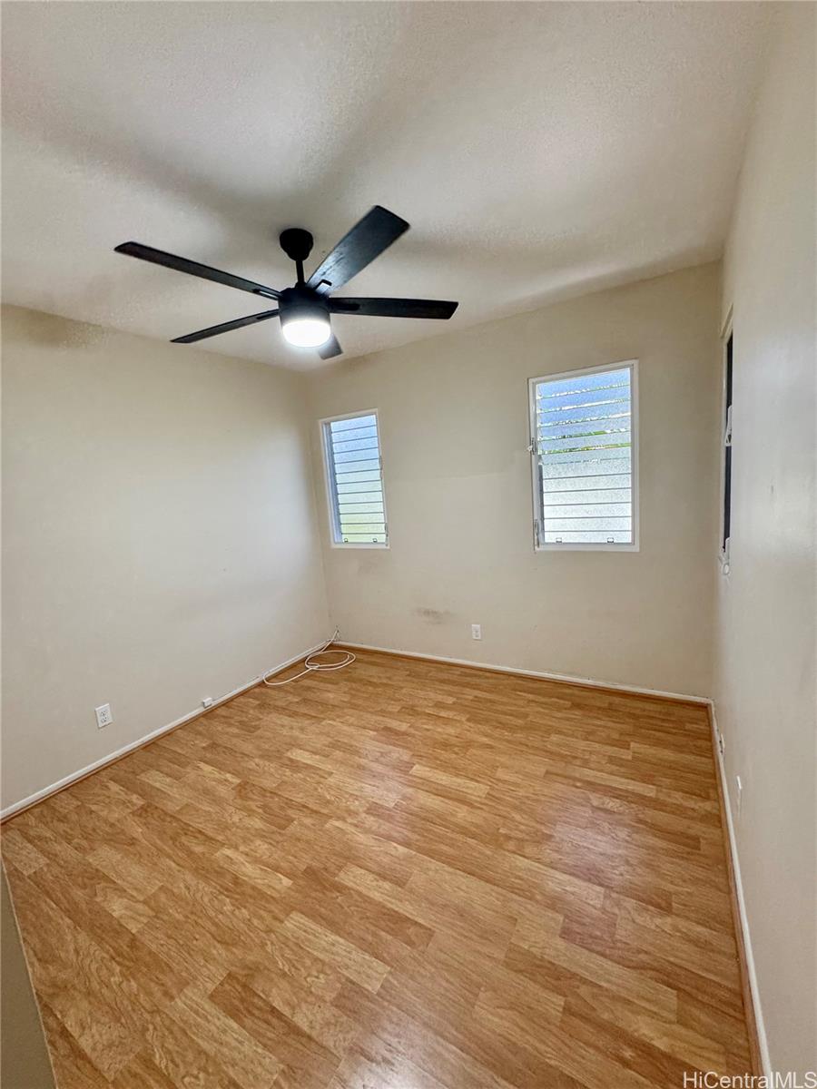 369 Opihikao Place, Unit 352 Honolulu, HI 96825 - Photo 25 of 25 a view of an empty room with a window