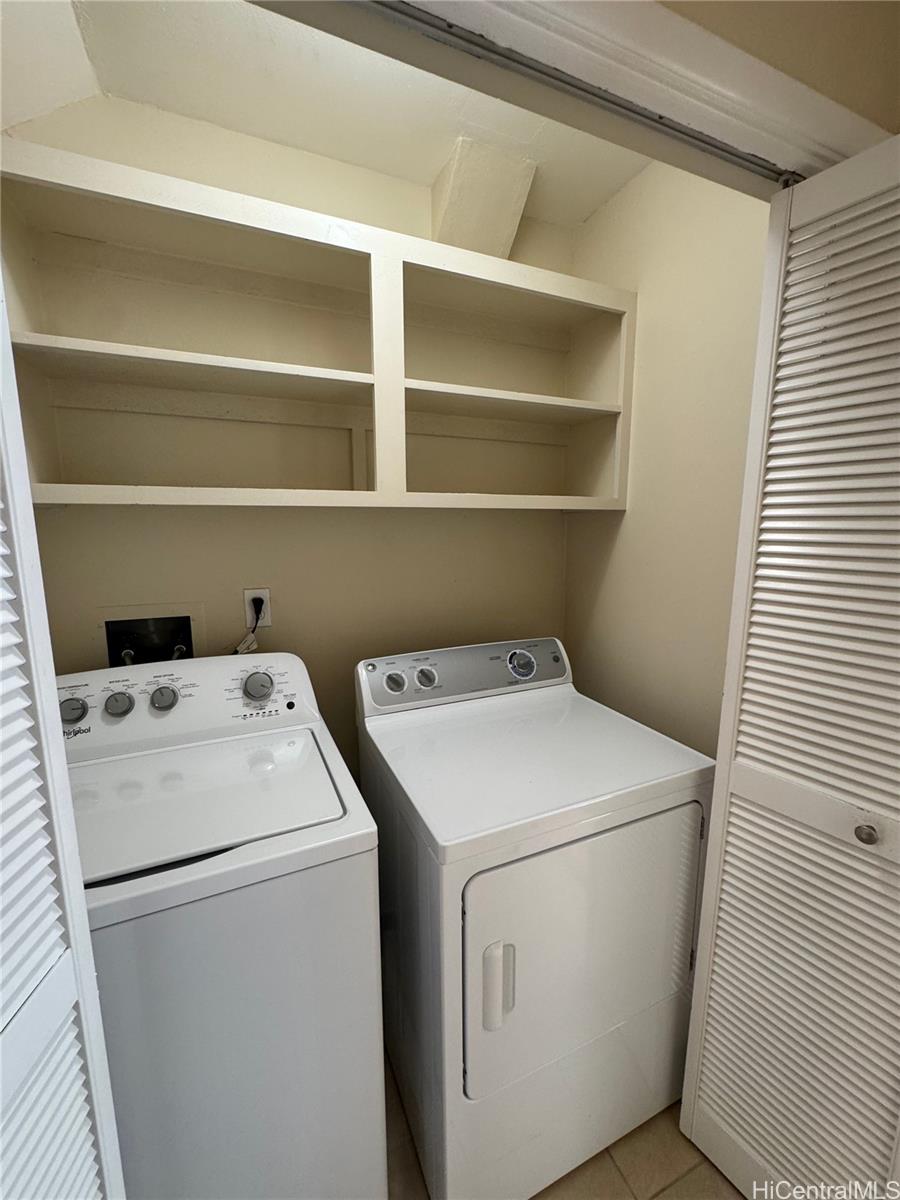 369 Opihikao Place, Unit 352 Honolulu, HI 96825 - Photo 9 of 25 a utility room with dryer and washer