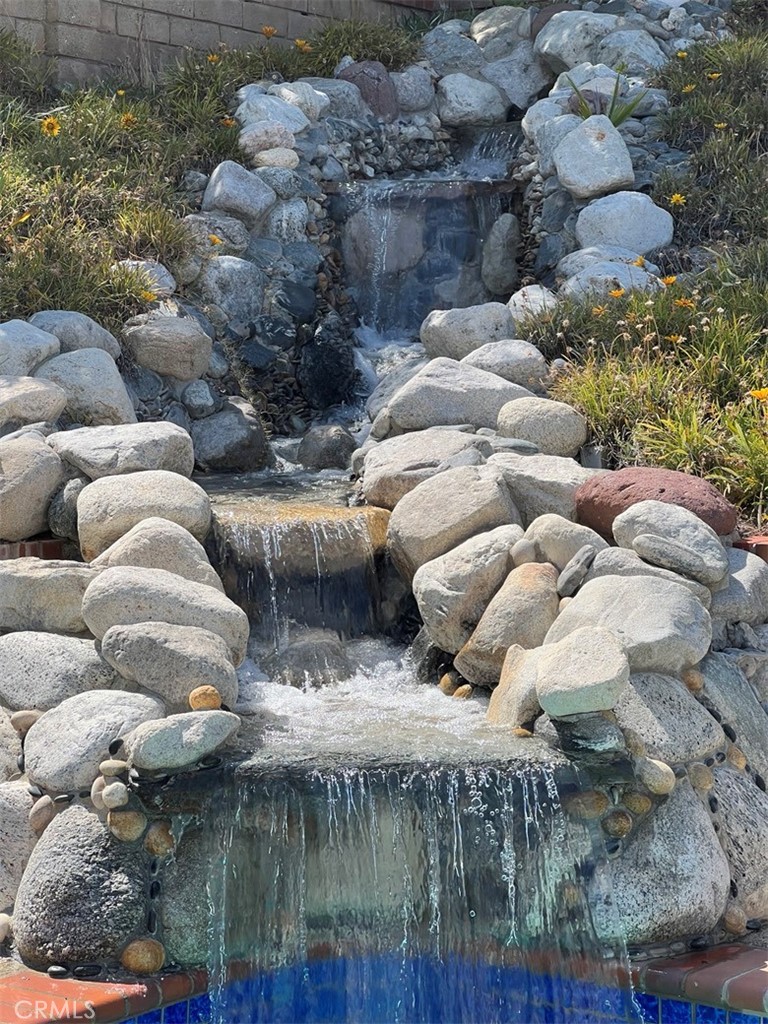 25225 Sagecrest Circle Stevenson Ranch, CA 91381 - Photo 10 of 50 Soothing waterfall into Pool