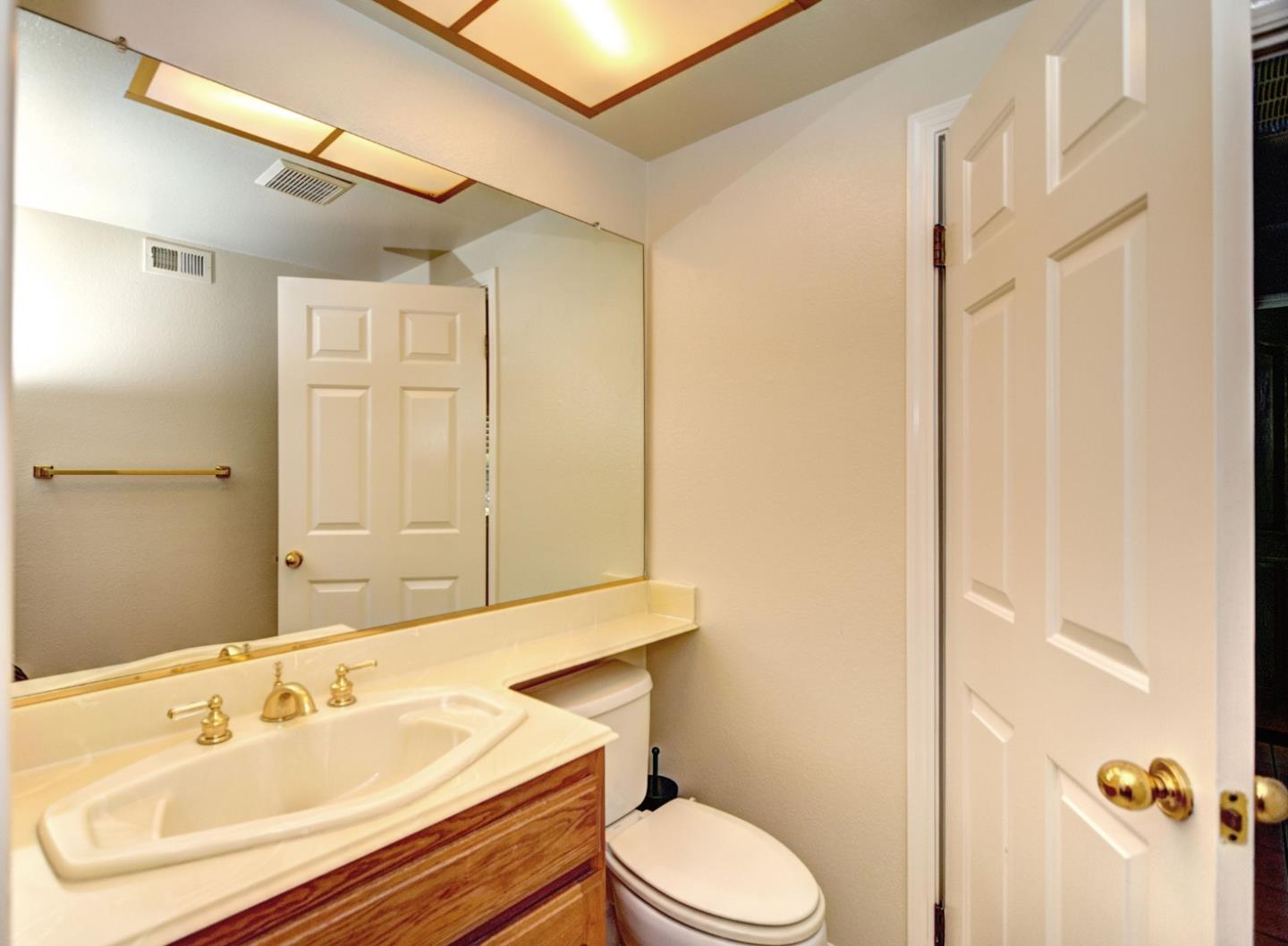 2201 Pinard Street Milpitas, CA 95035 - Photo 11 of 26 a bathroom with a sink toilet and shower