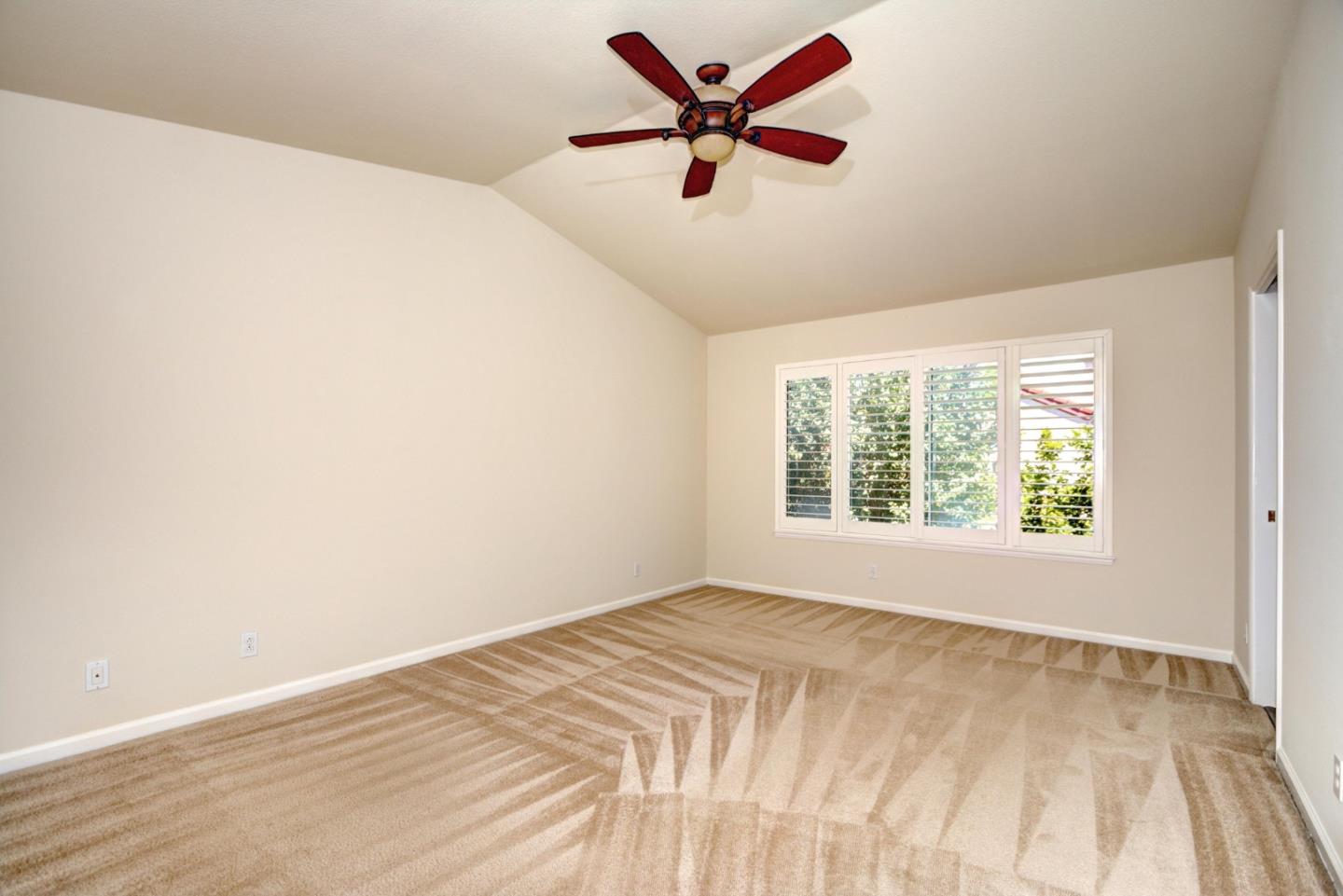 2201 Pinard Street Milpitas, CA 95035 - Photo 12 of 26 a view of a room with a window and a ceiling fan