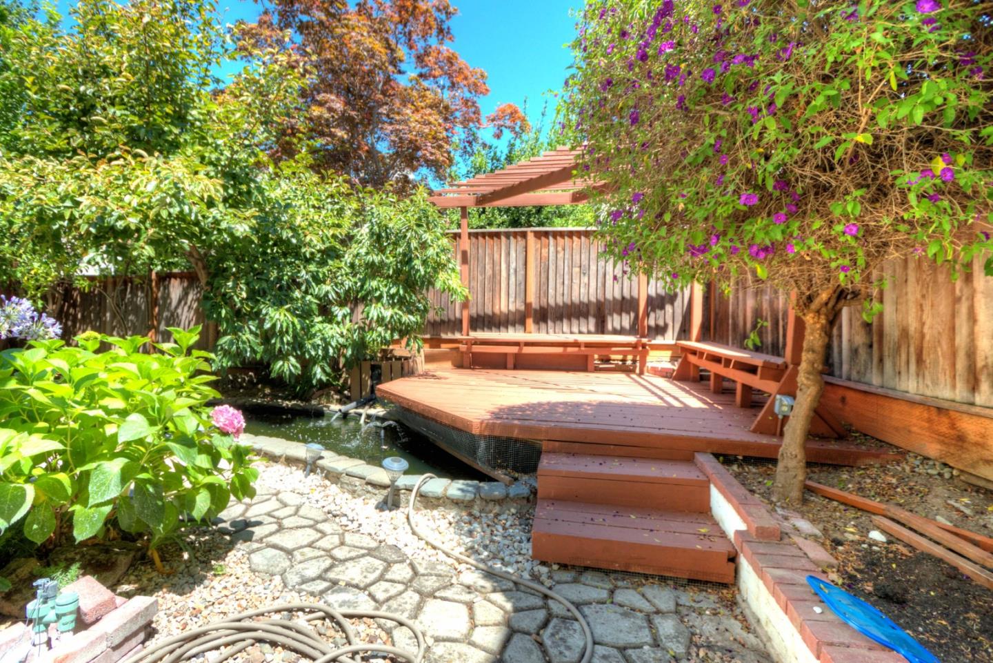 2201 Pinard Street Milpitas, CA 95035 - Photo 19 of 26 a view of a backyard with sitting area