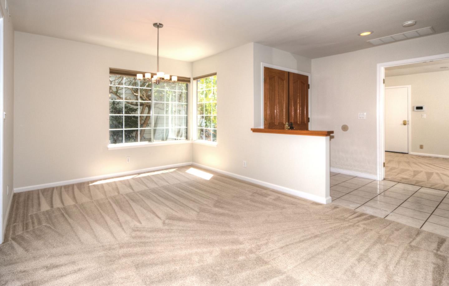 2201 Pinard Street Milpitas, CA 95035 - Photo 5 of 26 a view of an empty room with a window