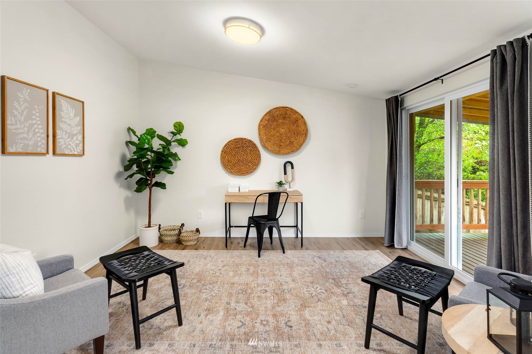10701 Holly Drive Everett, WA 98204 - Photo 19 of 33 a living room with furniture and a window