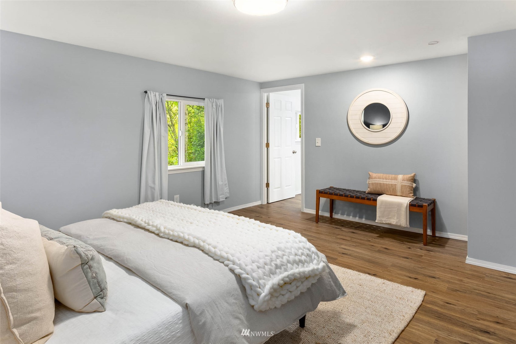 10701 Holly Drive Everett, WA 98204 - Photo 22 of 33 a bedroom with bed and a window