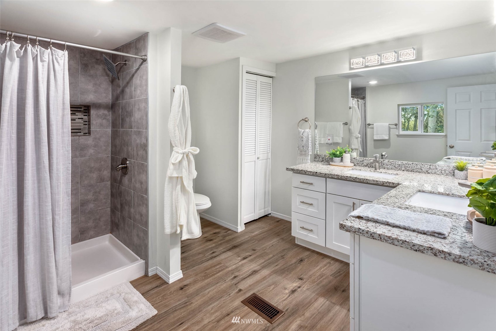 10701 Holly Drive Everett, WA 98204 - Photo 23 of 33 a kitchen with a refrigerator and a sink