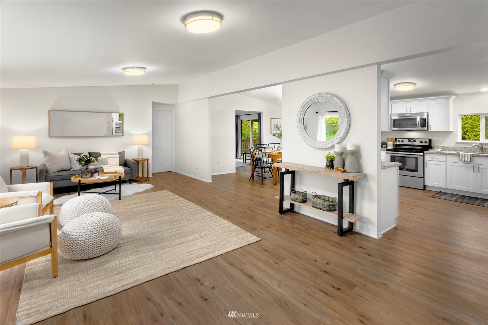 10701 Holly Drive Everett, WA 98204 - Photo 4 of 33 a living room with furniture and a wooden floor