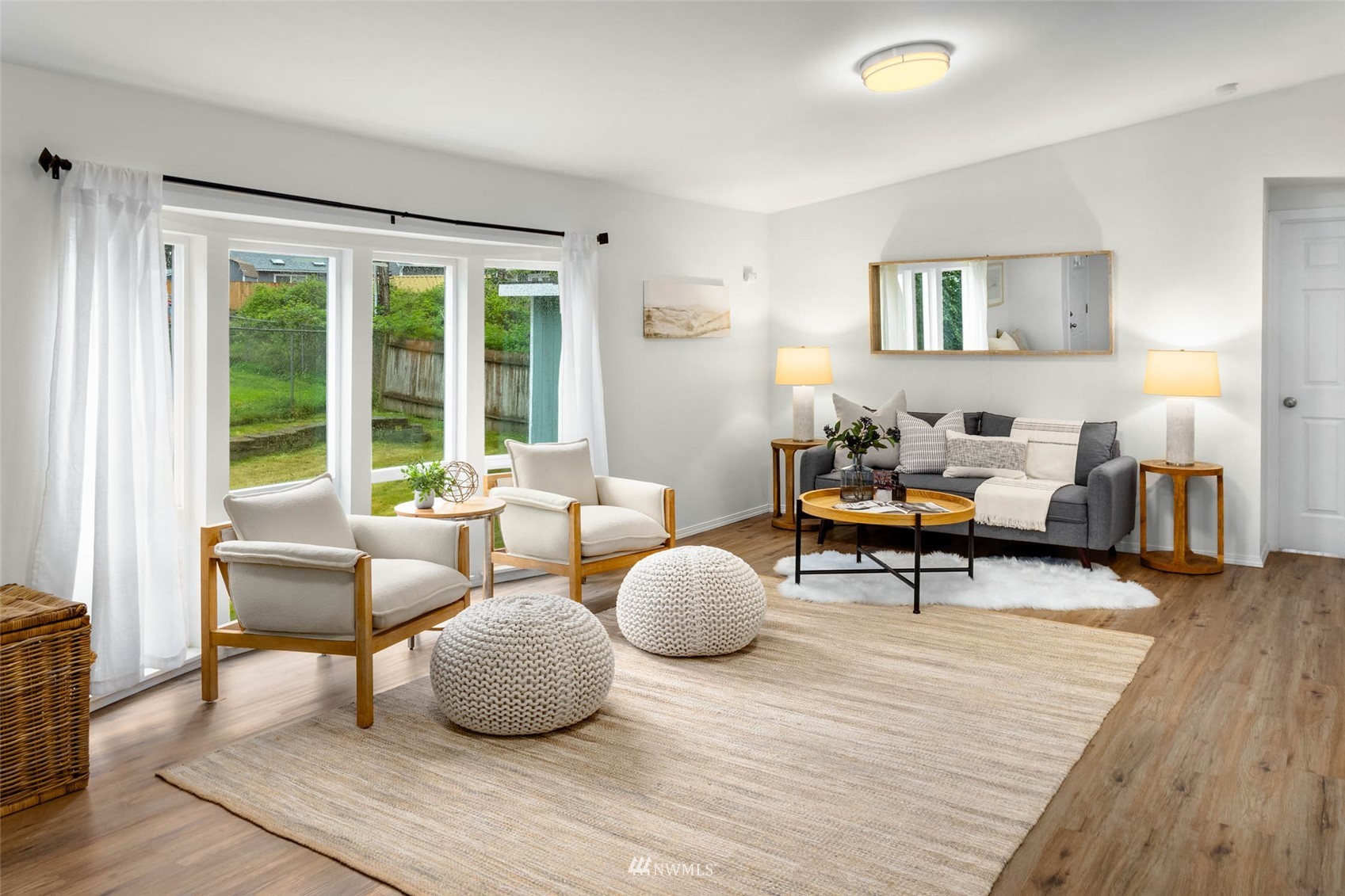 10701 Holly Drive Everett, WA 98204 - Photo 5 of 33 a living room with furniture and a wooden floor
