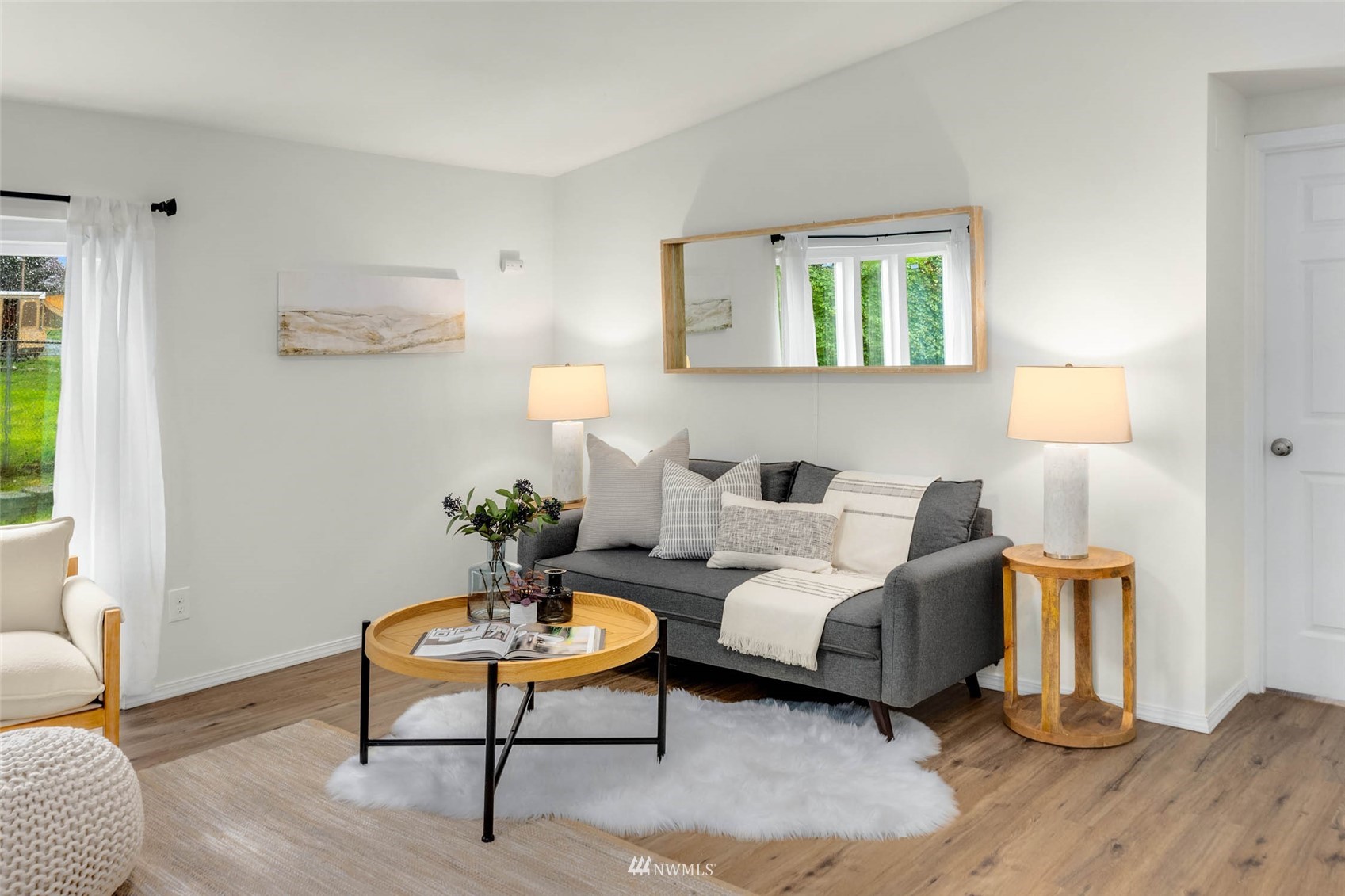 10701 Holly Drive Everett, WA 98204 - Photo 6 of 33 a living room with furniture and a lamp