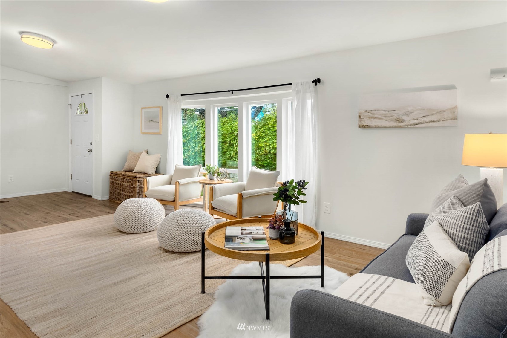 10701 Holly Drive Everett, WA 98204 - Photo 8 of 33 a living room with furniture and a large window