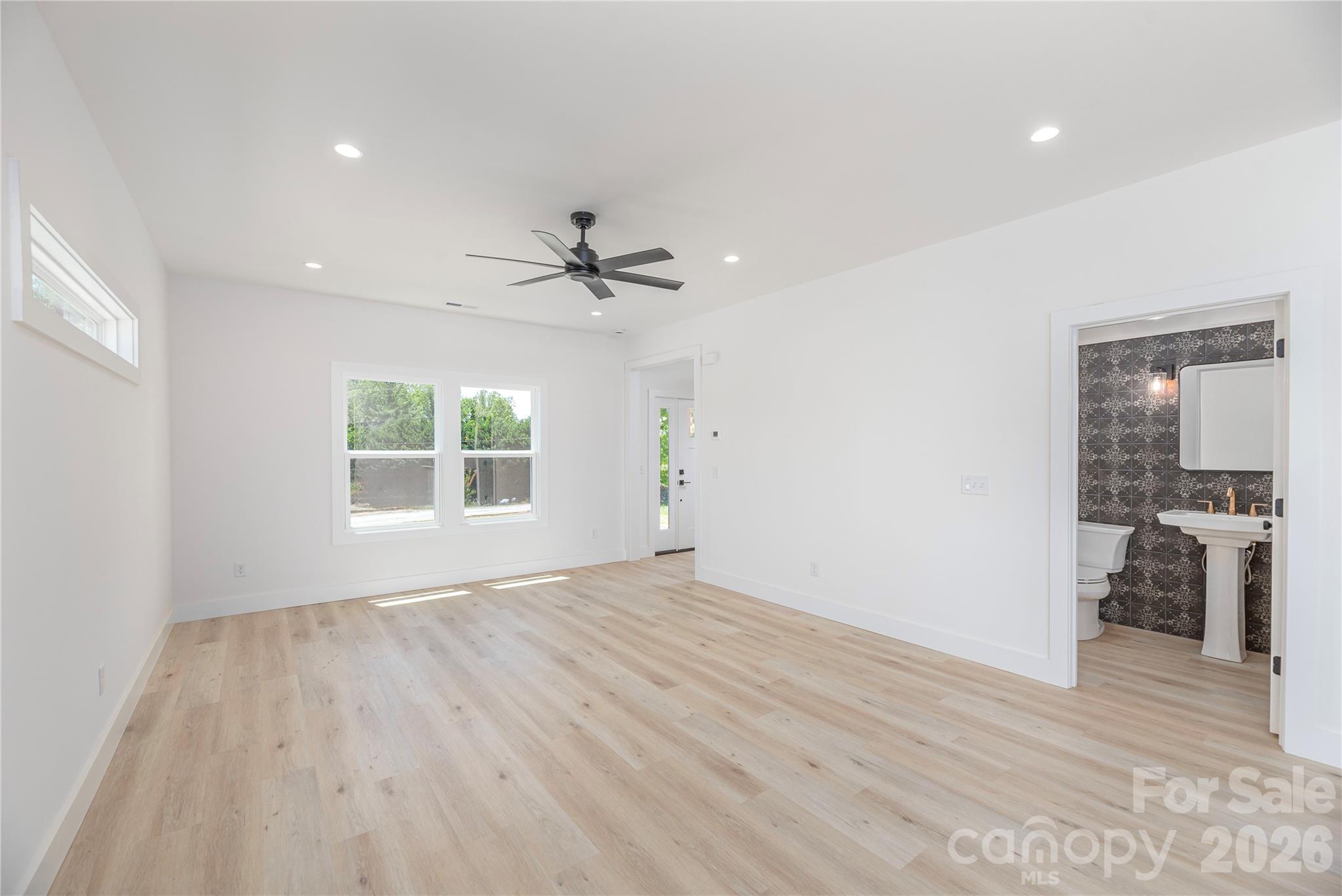 32 Oak Hill Road Candler, NC 28715 - Photo 6 of 29 a view of an empty room with a window