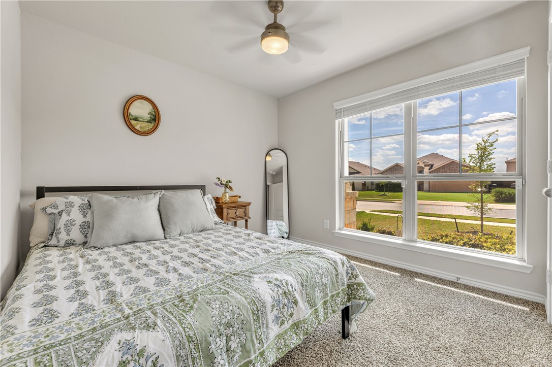 2016 Chief Street Bryan, TX 77807 - Photo 22 of 30 a bedroom with a bed and a window