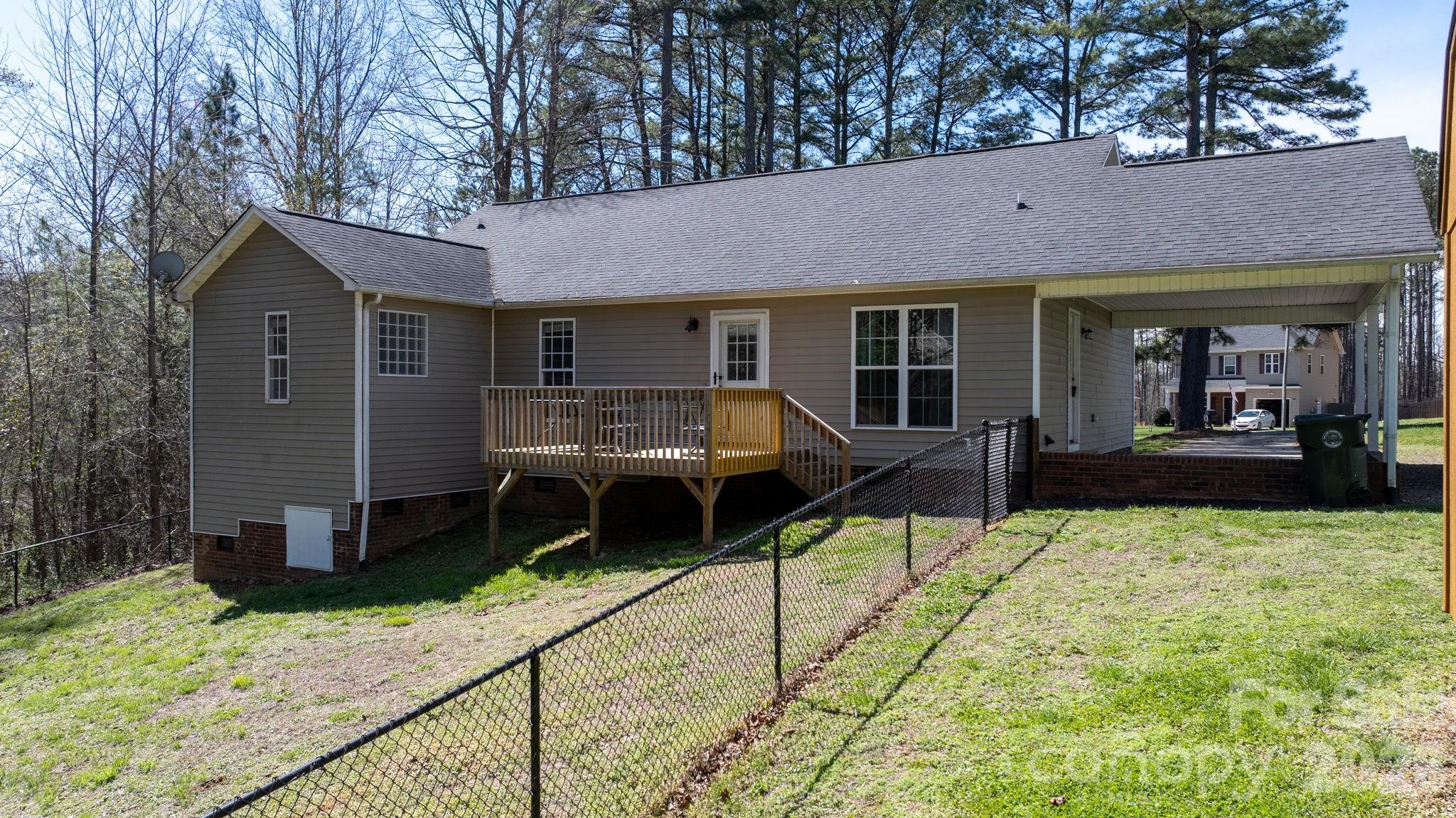 120 Wesley Court Crouse, NC 28033 - Photo 11 of 36 a front view of a house with garden