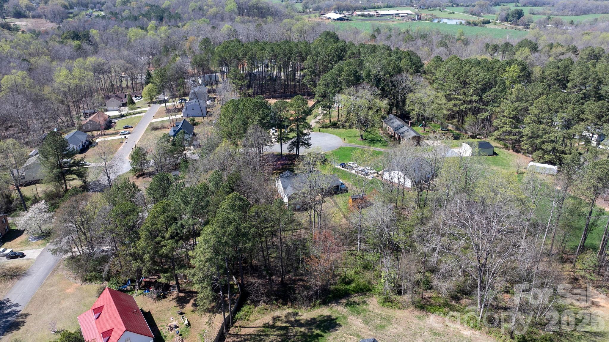 120 Wesley Court Crouse, NC 28033 - Photo 18 of 36 an aerial view of residential houses with outdoor space and trees